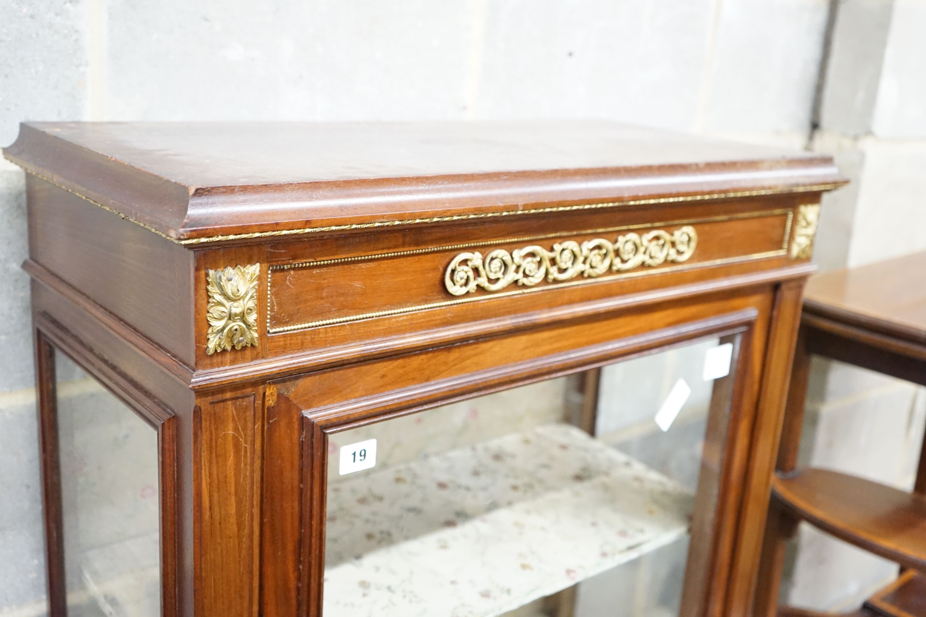 A French gilt metal mounted glazed mahogany vitrine, width 76cm, depth 35cm, height 163cm